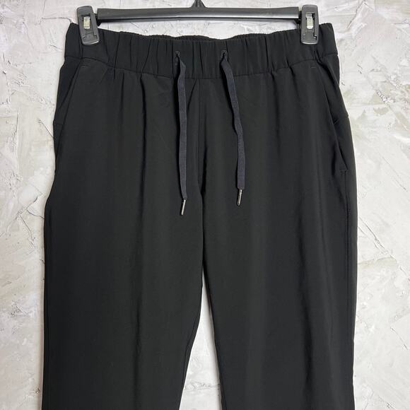 Lululemon On The Fly Pant Woven 28" WOMENS 8 Black Joggers Travel Pockets EUC - Picture 9 of 12
